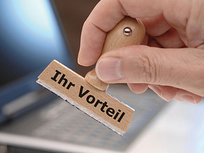 Ein Handstempel mit der Aufschrift „Ihr Vorteil“.